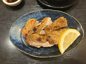 ���߂���